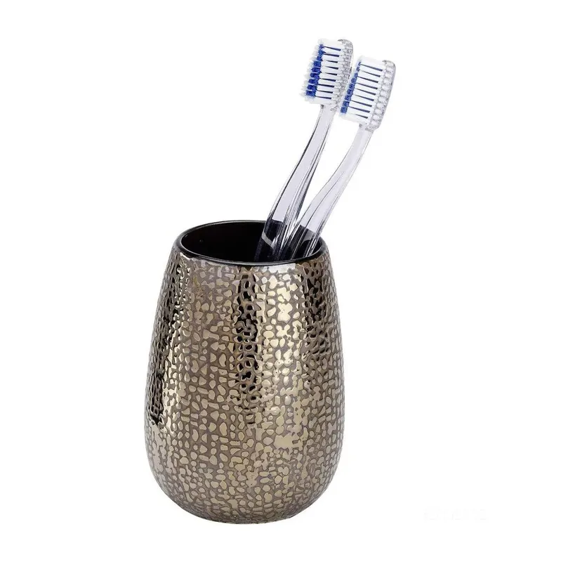 Bicchiere porta spazzolini e dentifricio in ceramica bronzo Polaris Marrakesh Wenko Bicchiere porta spazzolini e dentifricio in ceramica bronzo Polaris Marrakesh Wenko Echome Bestel Nu